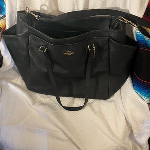 Coach purse it’s really big with lots of pockets